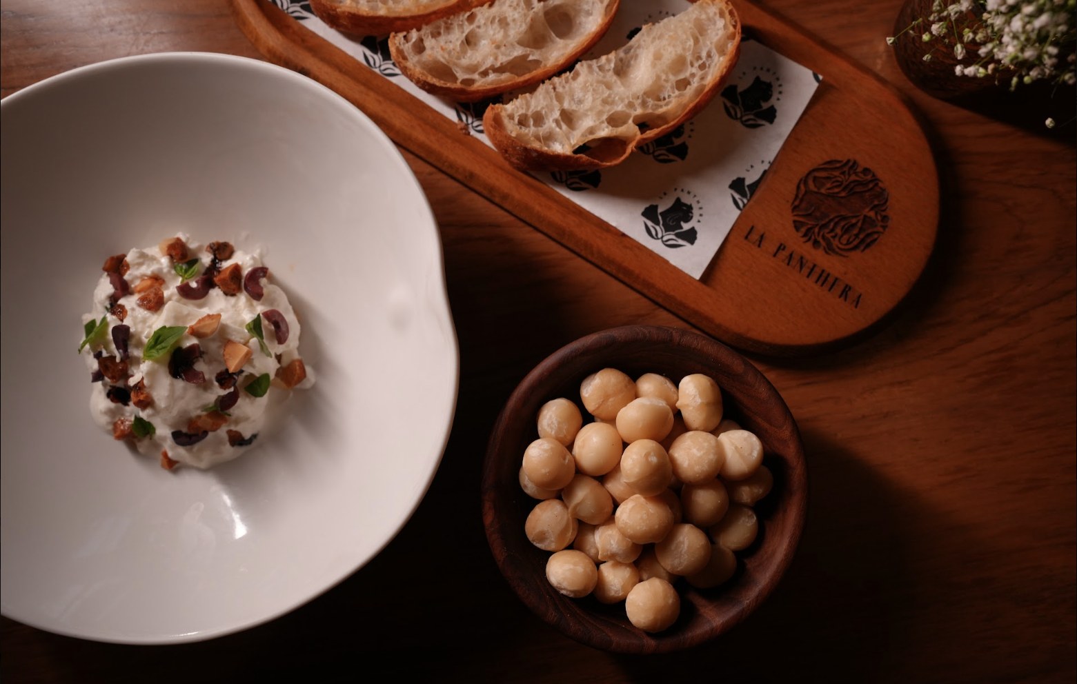 Macadamia dish and bread at La Panthera